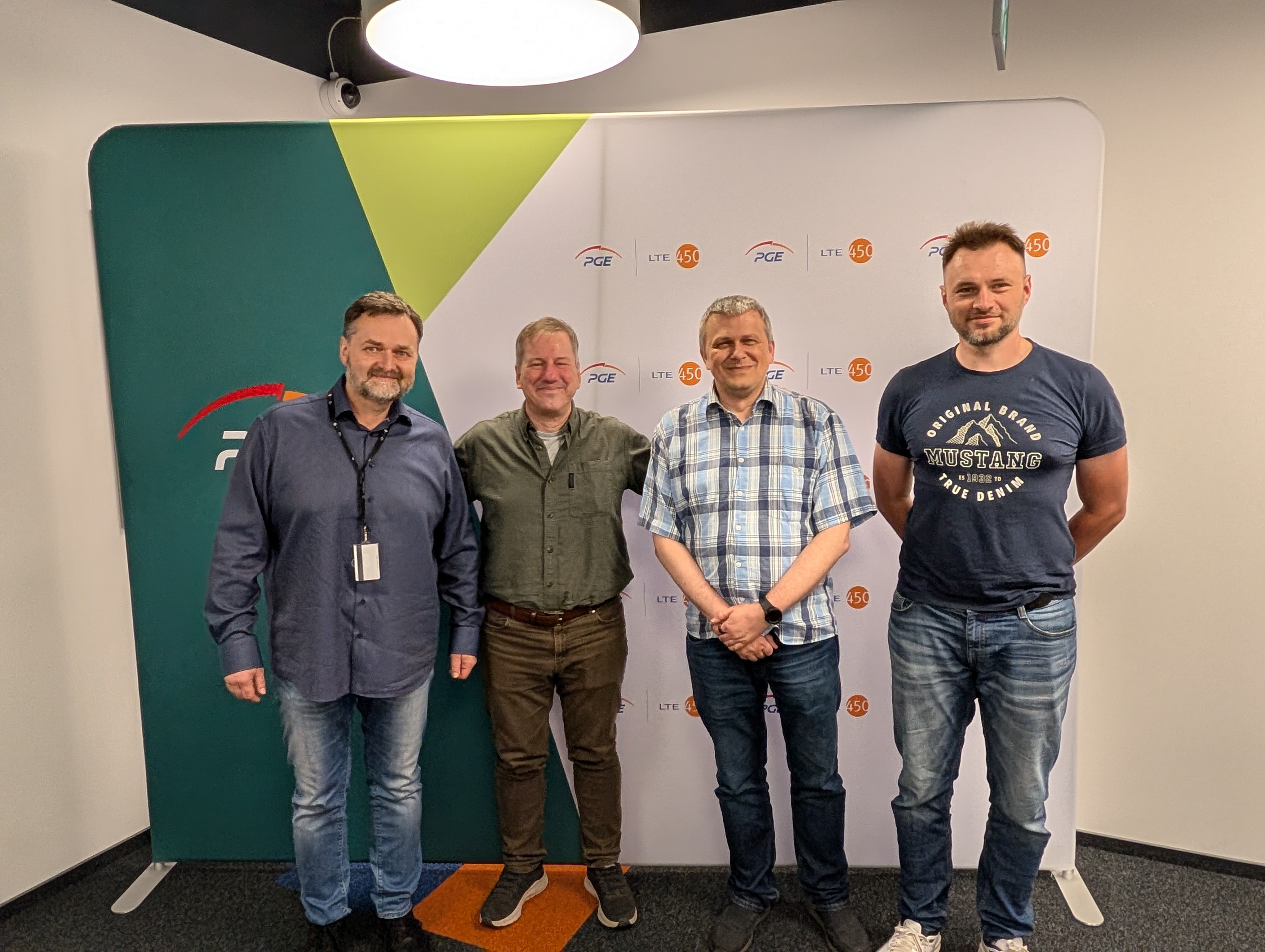 Kris, Maciej, and Anton at the PGE office
